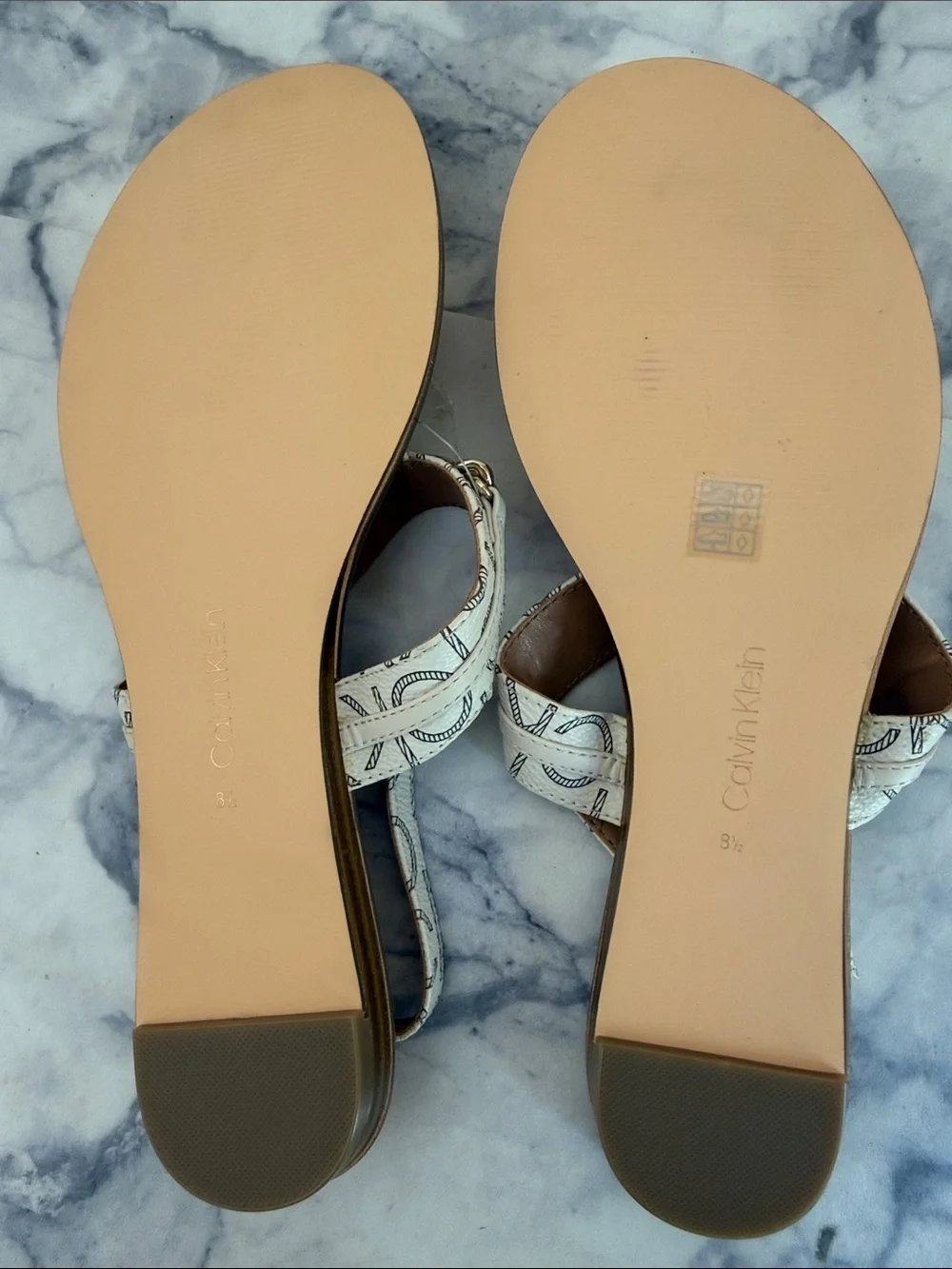Calvin Klein Cream Logo Print T-Strap Sandals with Gold Accents